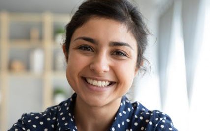 Smiling outsource employee in zoom meeting